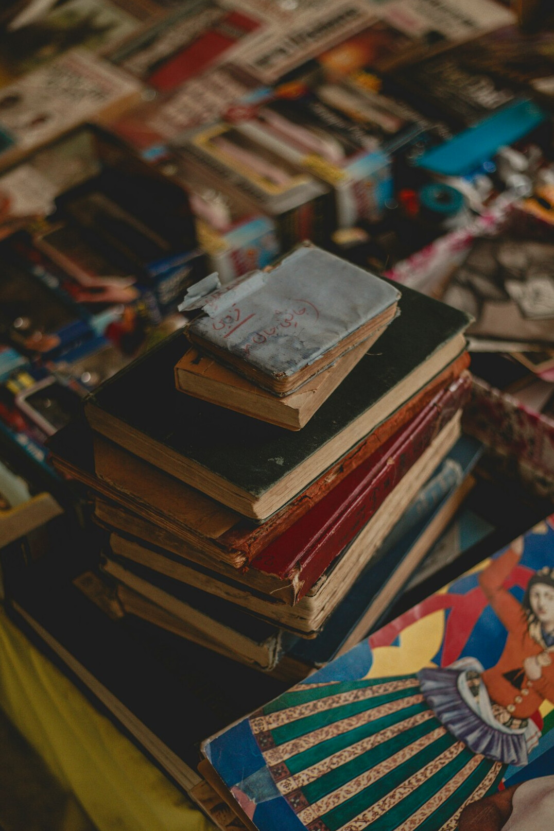 Stack of old books on a table