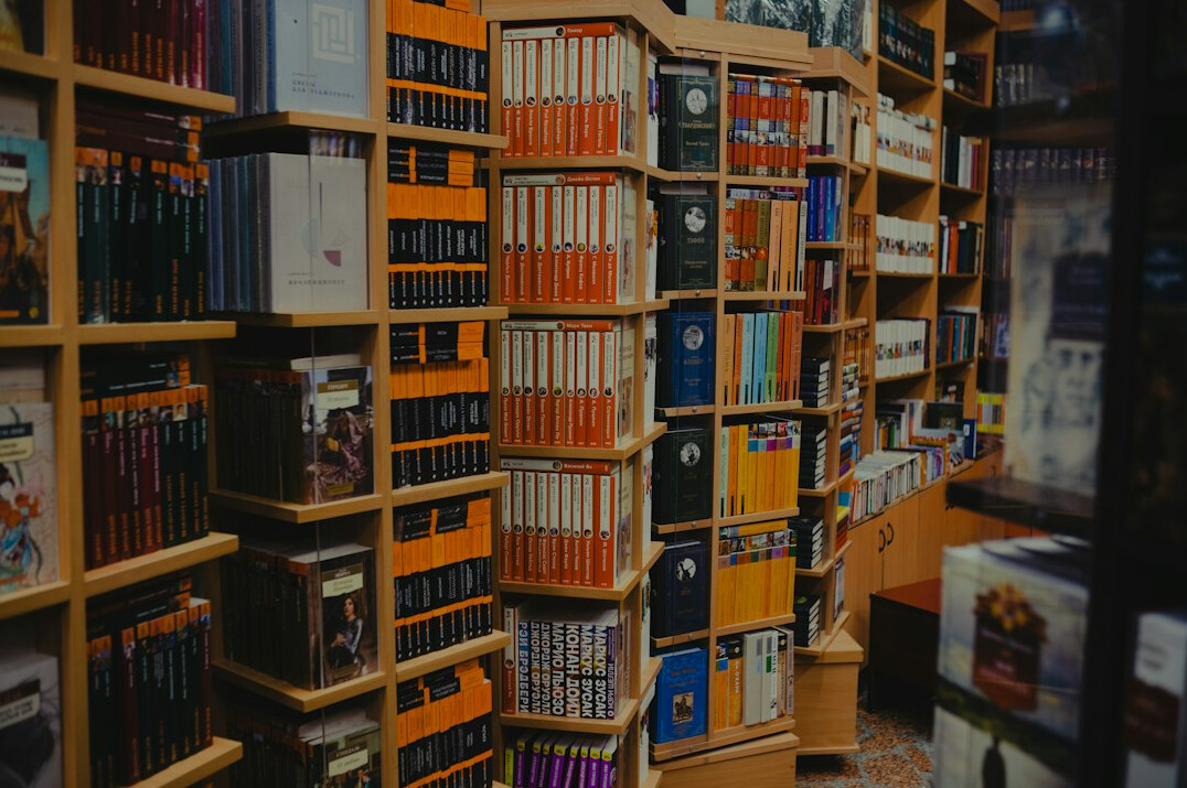 Stack of old books on a shelf