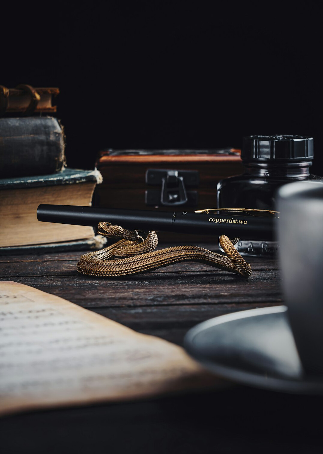 Writing desk with notebook and pen